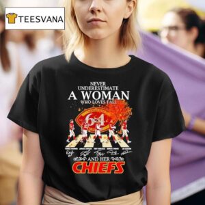 Never Underestimate A Woman Who Loves Fall And Her Kansas City Chiefs Walking Across Signatures T Shirt